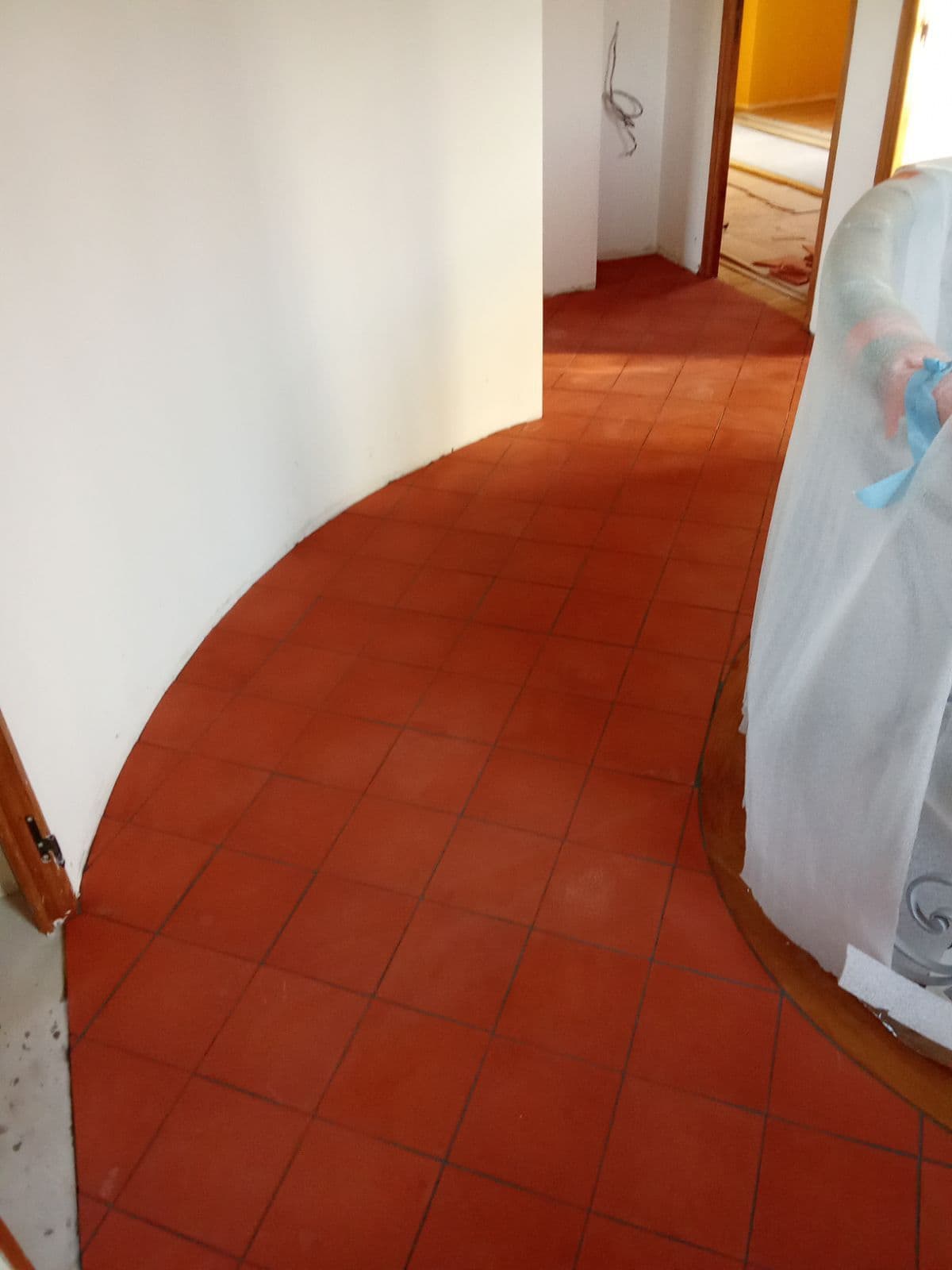 Réalisation d'un couloir en tomettes